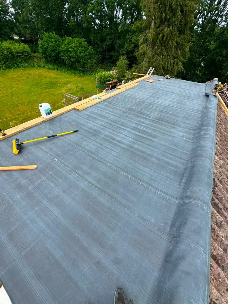 New EPDM rubber flat roof installation